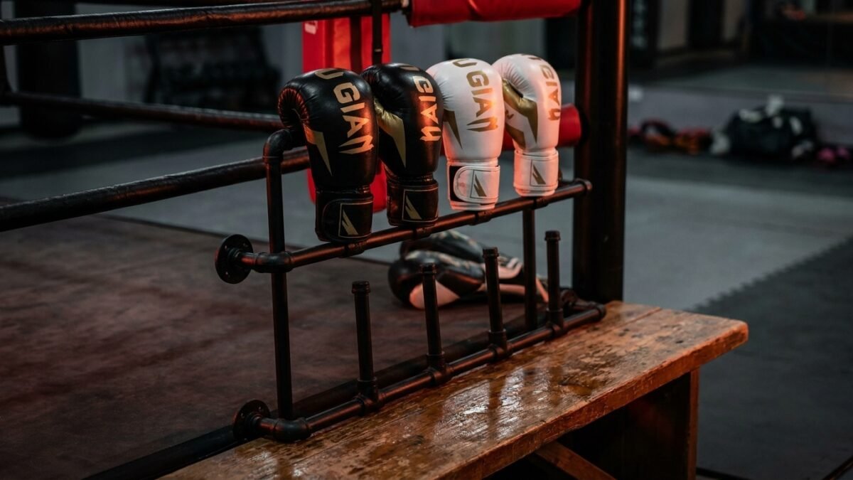 StrikeGearHQ realistic product-source feature image for Best Boxing Glove Display Wall Racks for Home Gyms (2026)